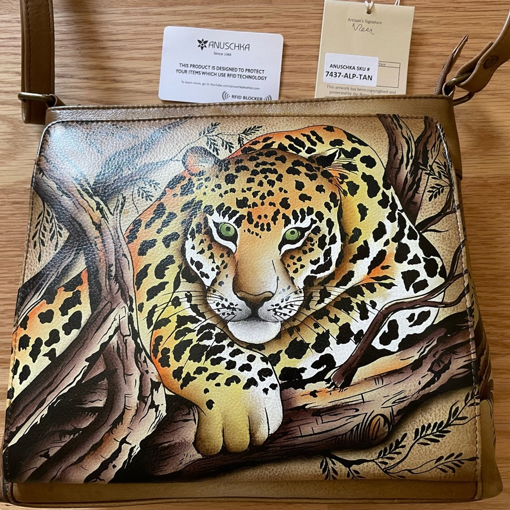 Brand-new Anuschka “Cheetah” leather handbag